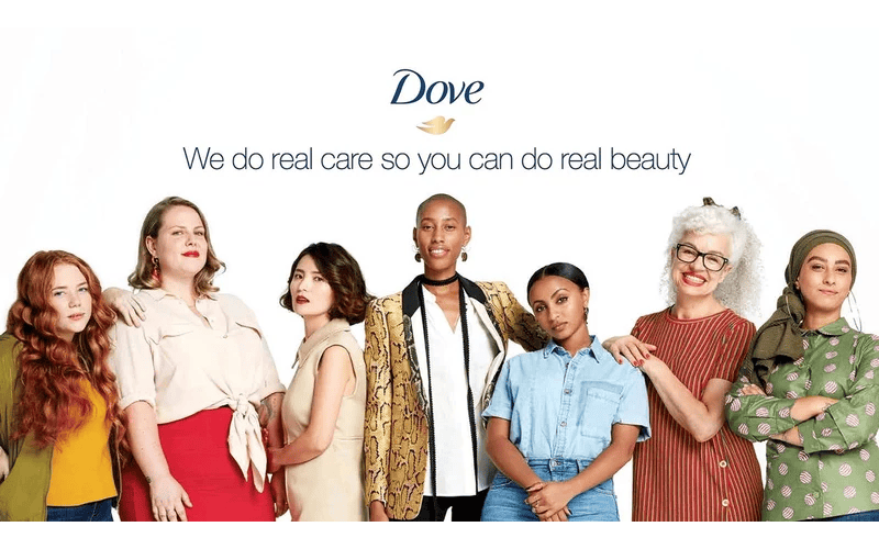 photo of Dove soap ad that says "We do real care so you can do real beauty" with a diverse group of women