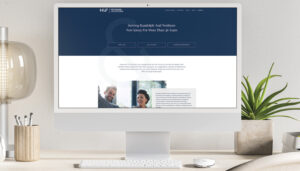 Heymann & Fletcher homepage shown on a desktop computer